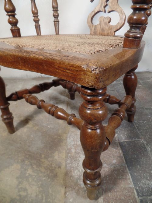 A PAIR OF ANTIQUE OAK SCROLL CAPTAINS SMOKER BOW ARM CHAIRS WITH BERGERE SEAT - ADDITIONAL PHOTO 9