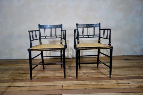 A PAIR OF REGENCY 19TH CENTURY EBONIZED GILDED OPEN ARM CHAIR CANED - ADDITIONAL PHOTO 4