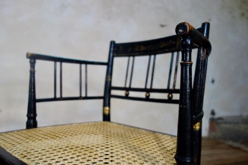 A PAIR OF REGENCY 19TH CENTURY EBONIZED GILDED OPEN ARM CHAIR CANED - ADDITIONAL PHOTO 8