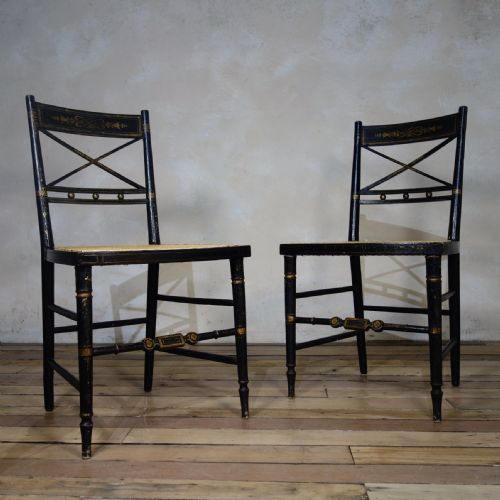 A PAIR OF REGENCY EBONISED AND CANED SIDE CHAIRS - ADDITIONAL PHOTO 1
