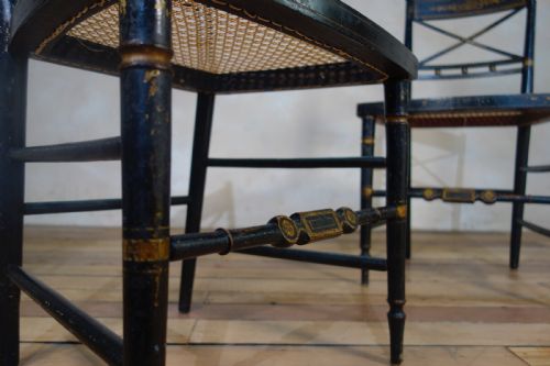 A PAIR OF REGENCY EBONISED AND CANED SIDE CHAIRS - ADDITIONAL PHOTO 3