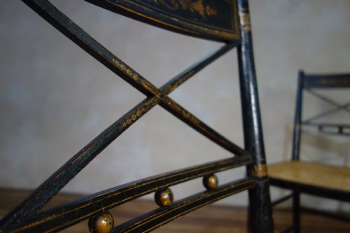 A PAIR OF REGENCY EBONISED AND CANED SIDE CHAIRS - ADDITIONAL PHOTO 5