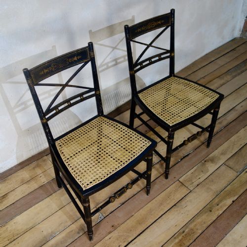 A PAIR OF REGENCY EBONISED AND CANED SIDE CHAIRS - ADDITIONAL PHOTO 8
