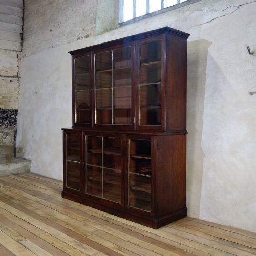 A REGENCY MAHOGANY GLAZED LIBRARY BOOKCASE PARCELGILT - ADDITIONAL PHOTO 7