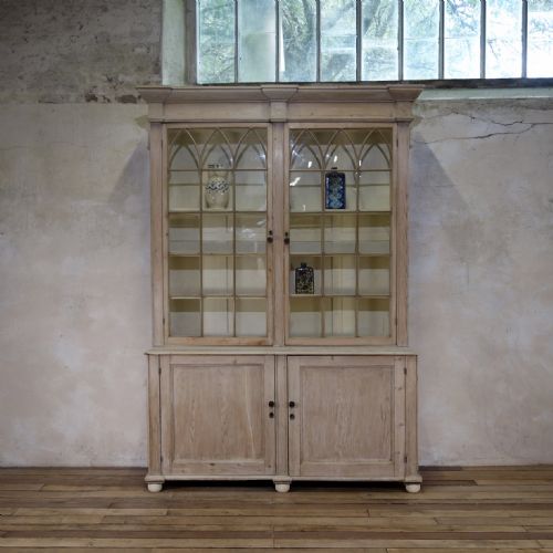 A 19TH CENTURY GOTHIC BLEACHED PINE GLAZED CABINET BOOKCASE - ADDITIONAL PHOTO 1