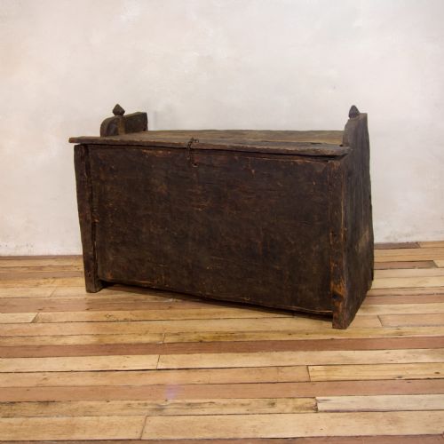 a late 18th century primitive cedar black painted settle trunk - CATEGORY: ANTIQUE CHESTS - DATED 18TH CENTURY