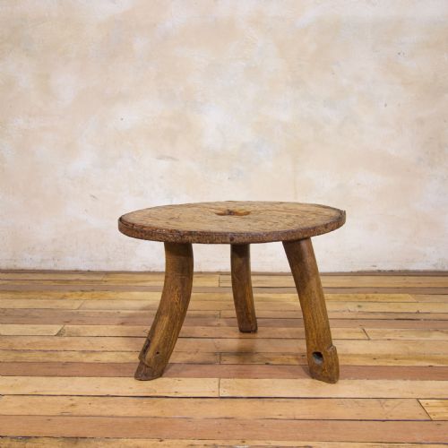an 18th century ox cart wheel top low side table - CATEGORY: ANTIQUE TABLES - DATED 19TH CENTURY