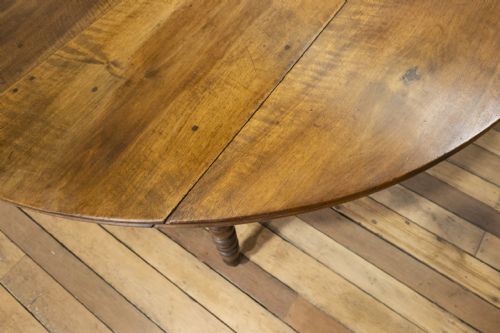 A 19TH CENTURY FRENCH CHESTNUT DROP LEAF TABLE - ADDITIONAL PHOTO 21