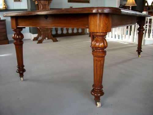 19TH CENTURY EXTENDING MAHOGANY DINING TABLE - ADDITIONAL PHOTO 2