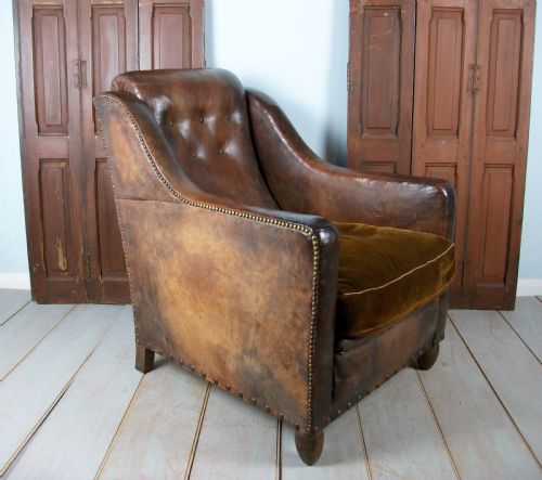 a leather 1930's deco club chair - CATEGORY: ANTIQUE CHAIRS - DATED 1930