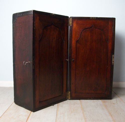 a 19th century campaign bookcase - CATEGORY: ANTIQUE CABINETS - DATED VICTORIAN