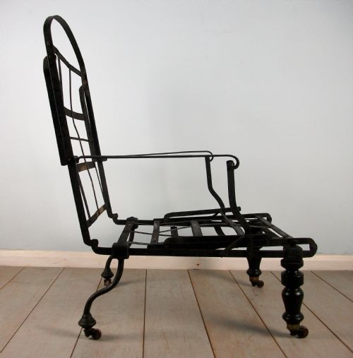 A CAMPAIGN METAMORPHIC ARMCHAIR DAYBED - ADDITIONAL PHOTO 1