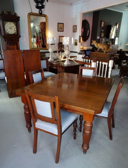 A LARGE VICTORIAN EXTENDING WIND OUT WALNUT DINING TABLE - ADDITIONAL PHOTO 10