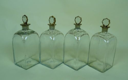 four antique georgian glass spirit decanters - CATEGORY: ANTIQUE GLASS - DATED 18TH CENTURY