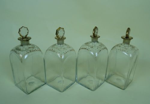 FOUR ANTIQUE GEORGIAN GLASS SPIRIT DECANTERS - ADDITIONAL PHOTO 1