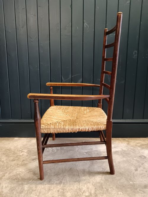 LIBERTY CO ARTS CRAFTS LOW LADDER BACK ARMCHAIR WITH RUSH SEAT C 1900 - ADDITIONAL PHOTO 4
