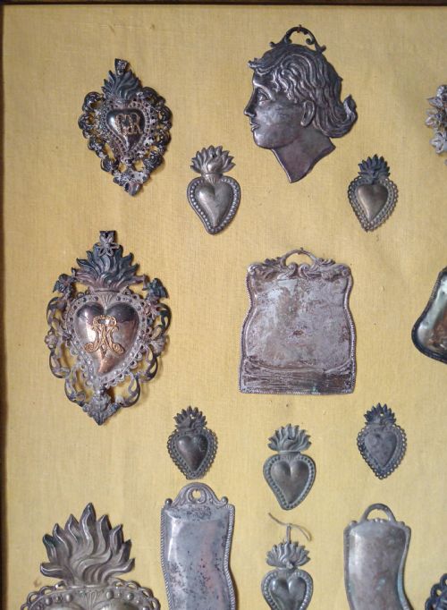 A RARE FRAMED COLLECTION OF SEVENTEEN ANTIQUE EXVOTOS - ADDITIONAL PHOTO 1