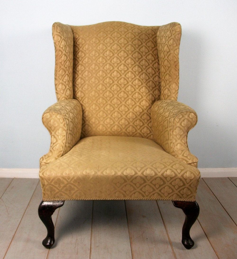 A fine quality Edwardian Wing Back Armchair of Georgian Design