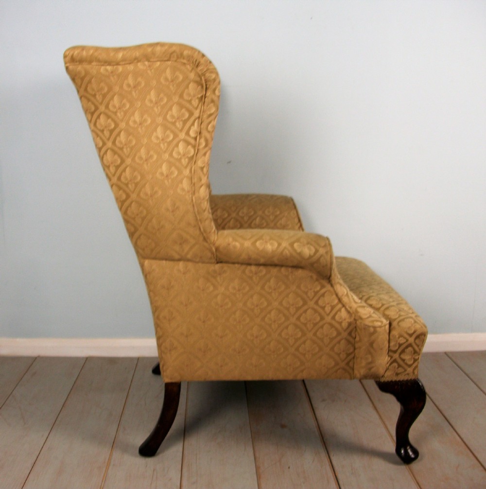 A fine quality Edwardian Wing Back Armchair of Georgian Design View III