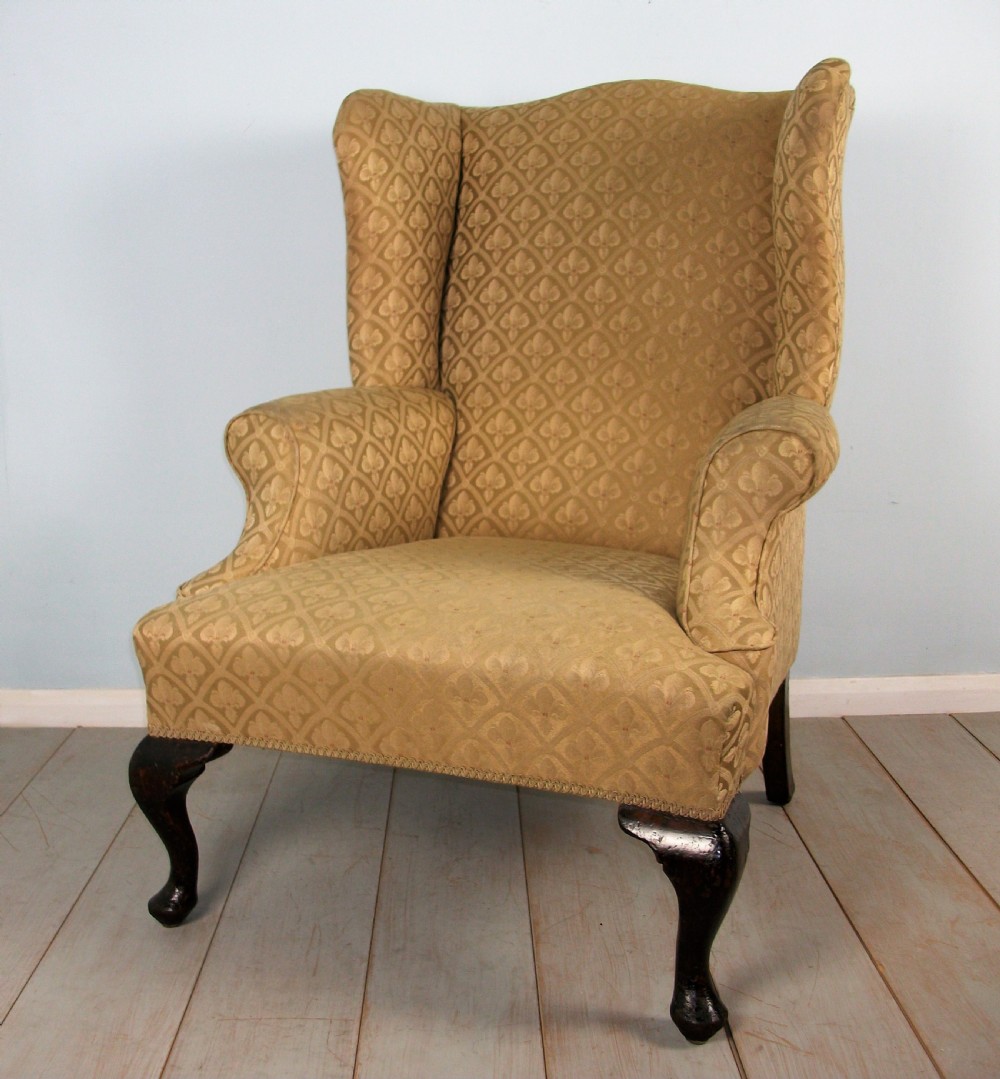 A fine quality Edwardian Wing Back Armchair of Georgian Design View IV