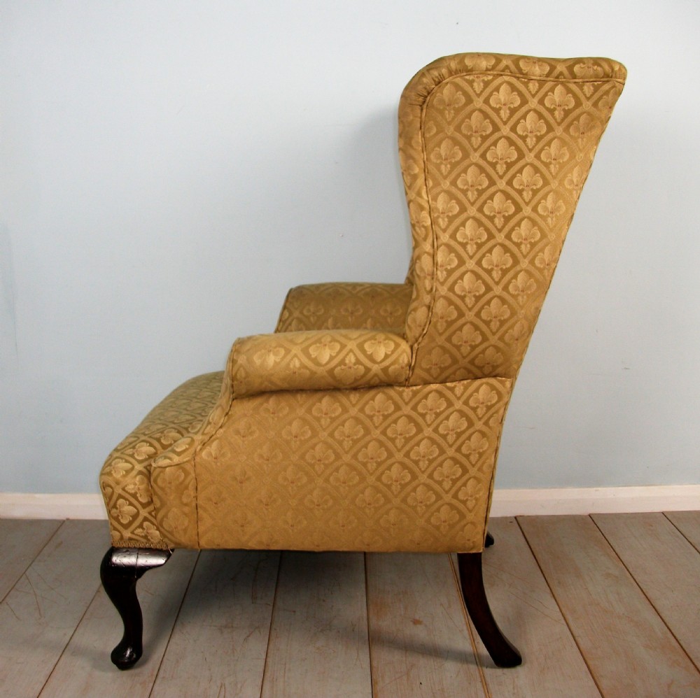 A fine quality Edwardian Wing Back Armchair of Georgian Design View VI