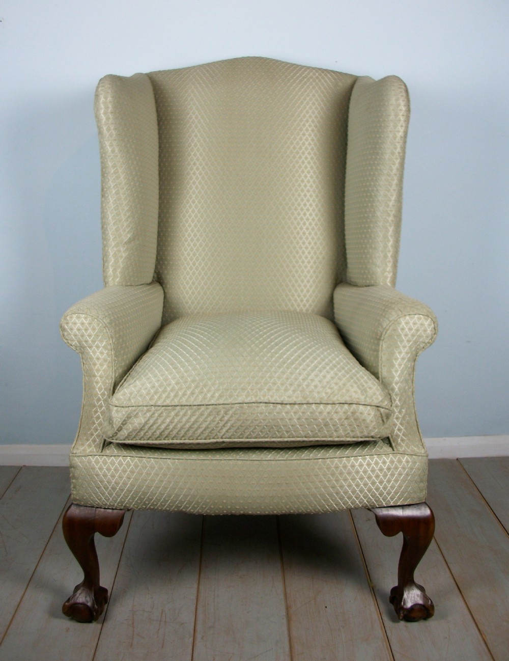 A fine quality Edwardian Wing Back Armchair of Georgian Design
