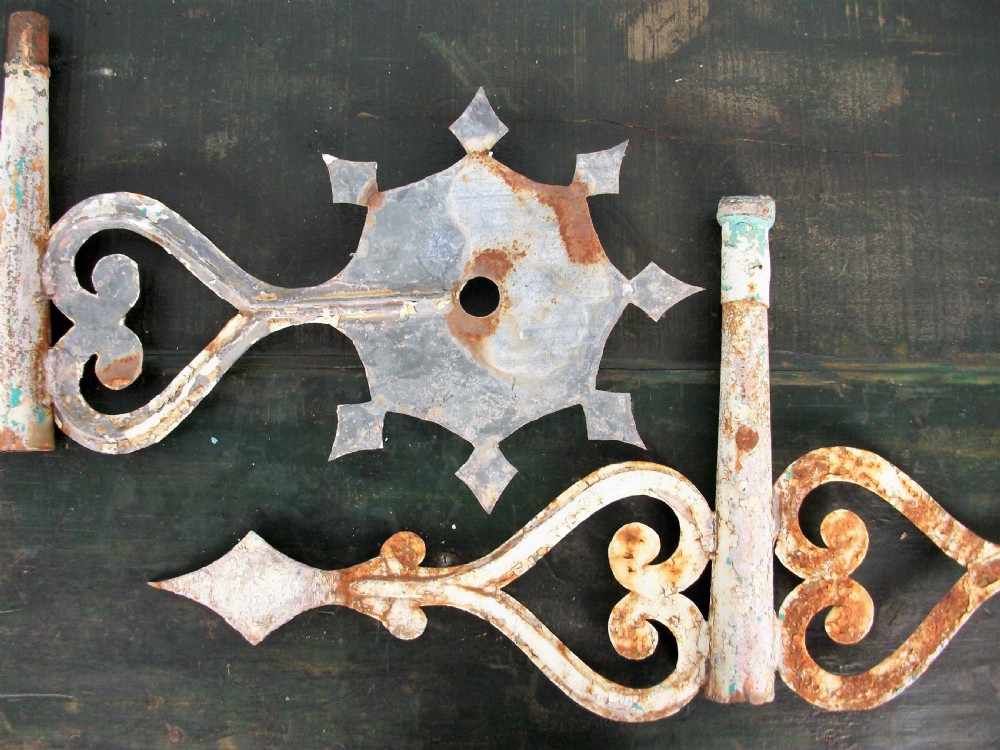 Pair of very decorative weather vanes