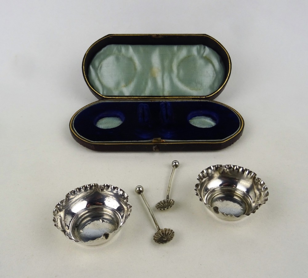 Cased Pair of Victorian Silver Salts and spoons View II