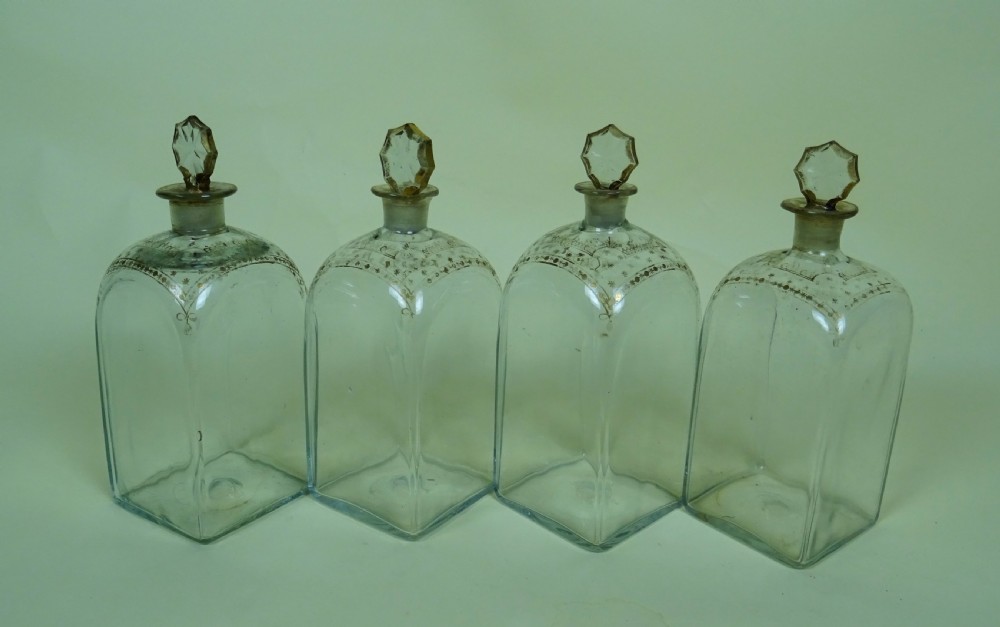 Four Antique Georgian Glass Spirit Decanters