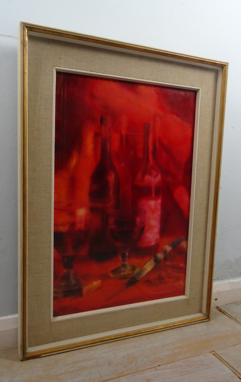 A vertical mid-century oil painting depicting wine bottles, stemmed glasses, and a corkscrew in rich shades of crimson and red. View III