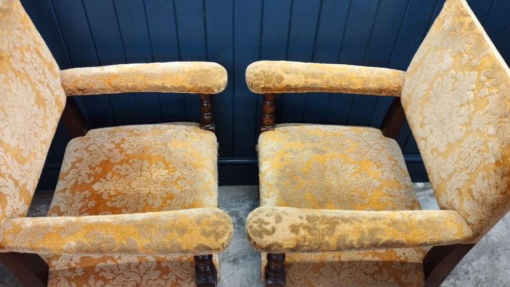 A pair of Italian style open armchairs with dark bobbin turned frames and gold damask upholstery with fringe trim. View V