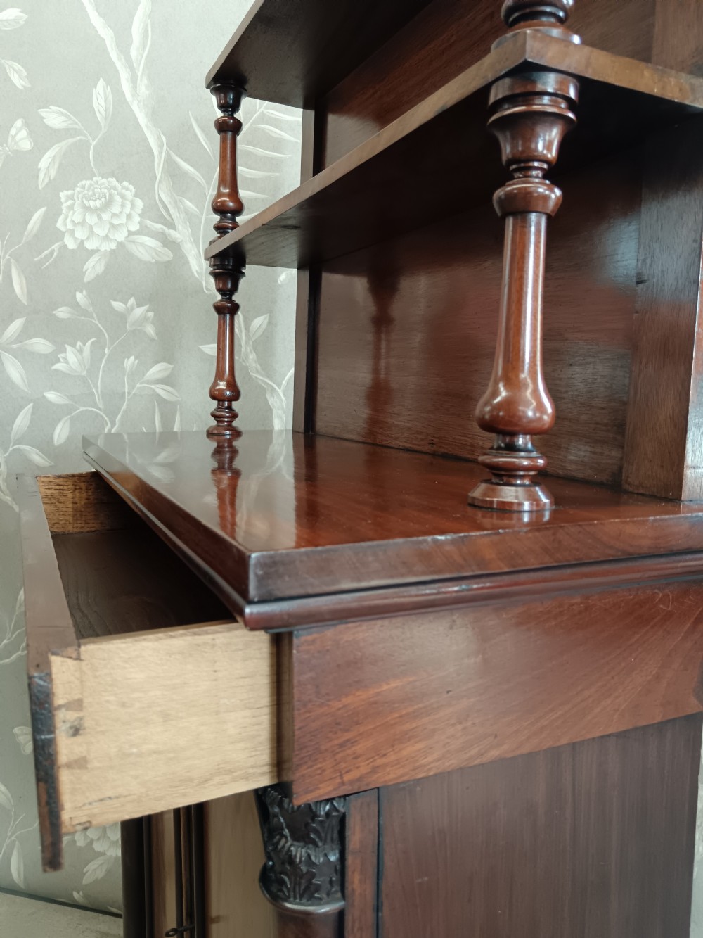 A Regency mahogany chiffonier featuring a two-tier open shelf superstructure above a two-door lower cabinet with arched panel doors and turned columns. View VIII