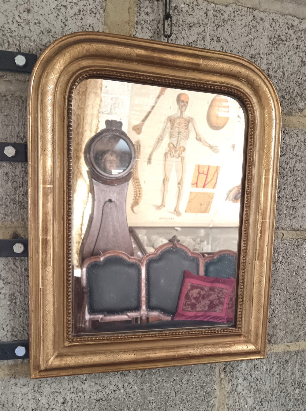 A 19th-century French arched wall mirror featuring a giltwood frame with rounded top corners and beaded inner trim. View II