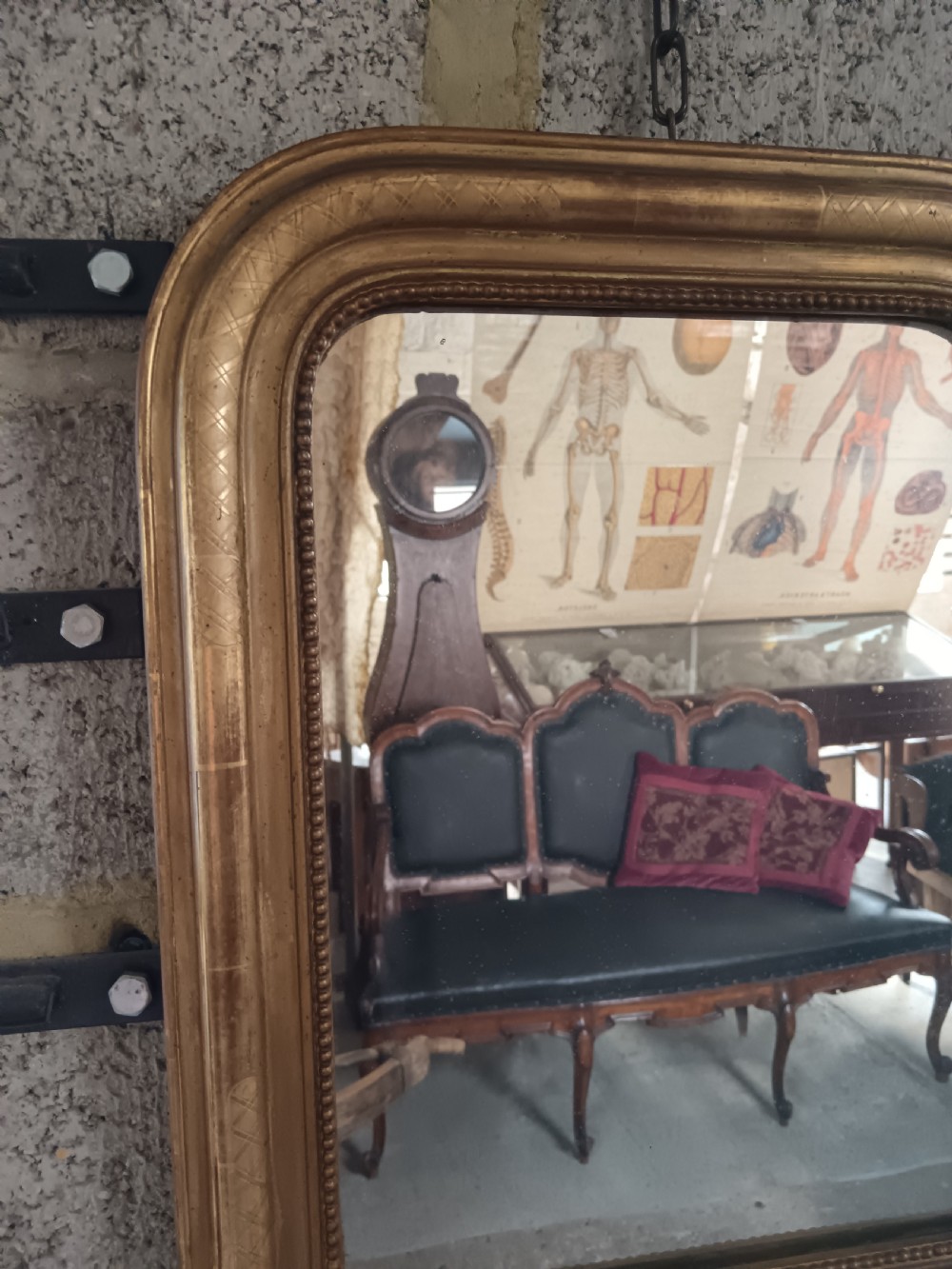 A 19th-century French arched wall mirror featuring a giltwood frame with rounded top corners and beaded inner trim. View III