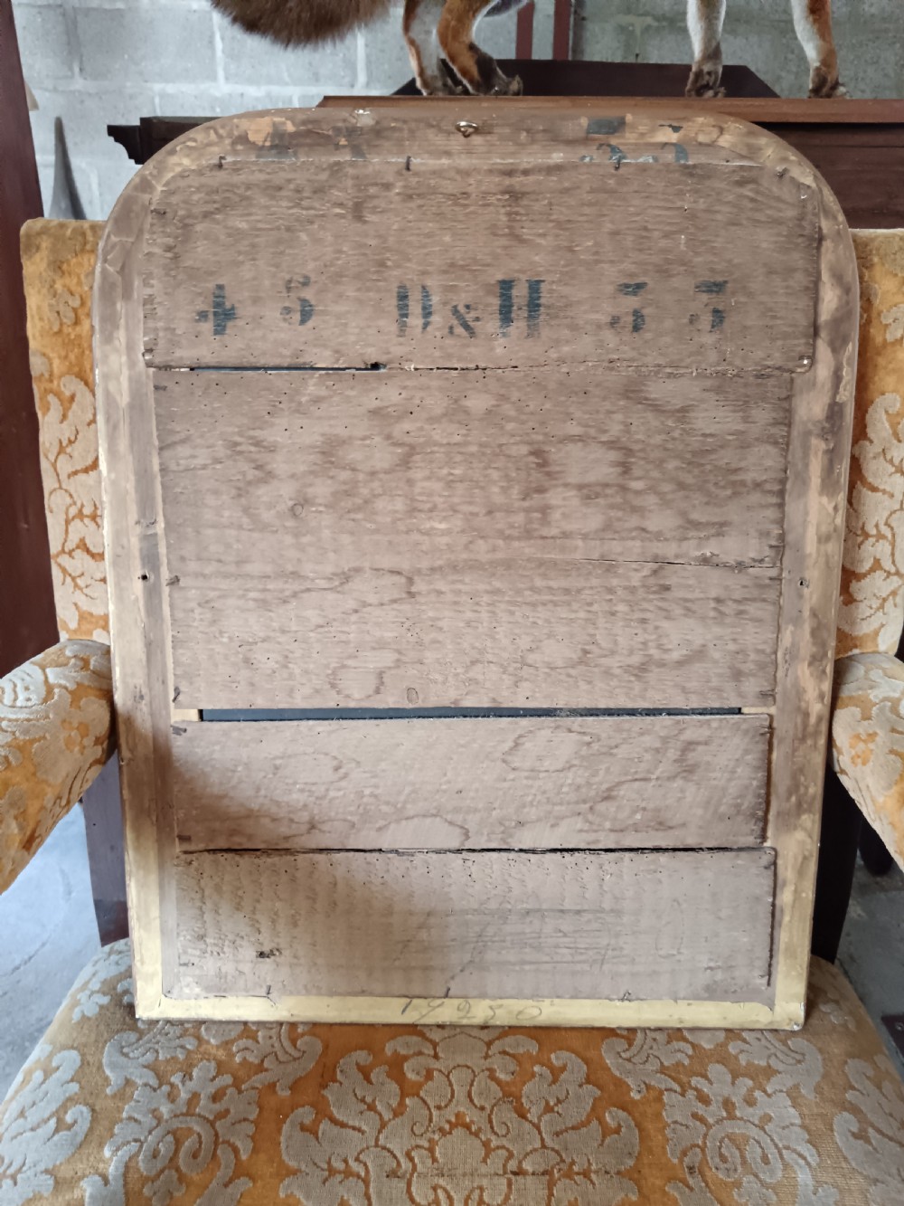 A 19th-century French arched wall mirror featuring a giltwood frame with rounded top corners and beaded inner trim. View VI