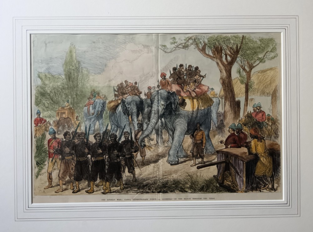 Framed hand-coloured Victorian wood engraving depicting soldiers and elephants marching through a landscape during the Second Anglo-Afghan War.