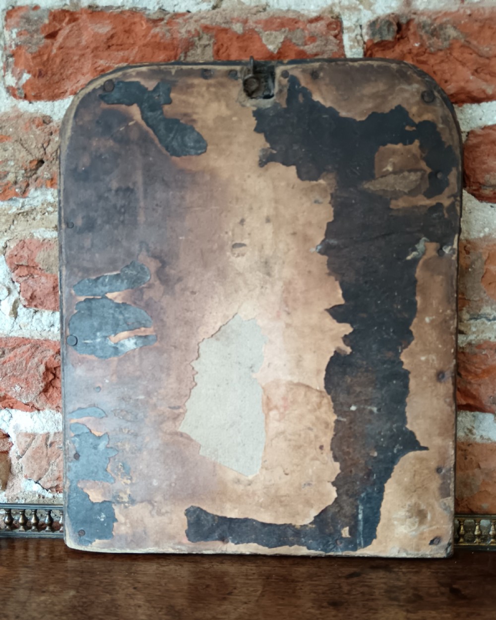 A petite 19th-century French Louis Philippe wall mirror featuring a moulded wooden frame with rounded upper corners and aged glass plate. View III