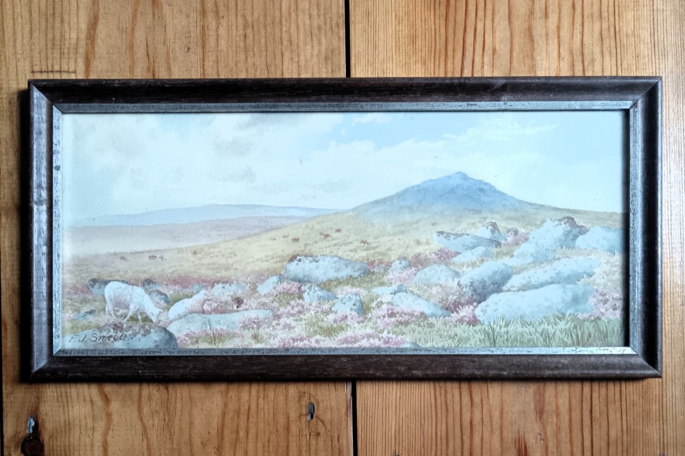 A pair of framed Edwardian watercolour paintings depicting rocky British moorland landscapes with grazing sheep under cloudy skies. View II