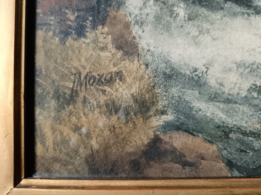 An antique framed watercolour painting depicting crashing ocean waves against a rocky arch and cliff under an overcast grey sky. View II