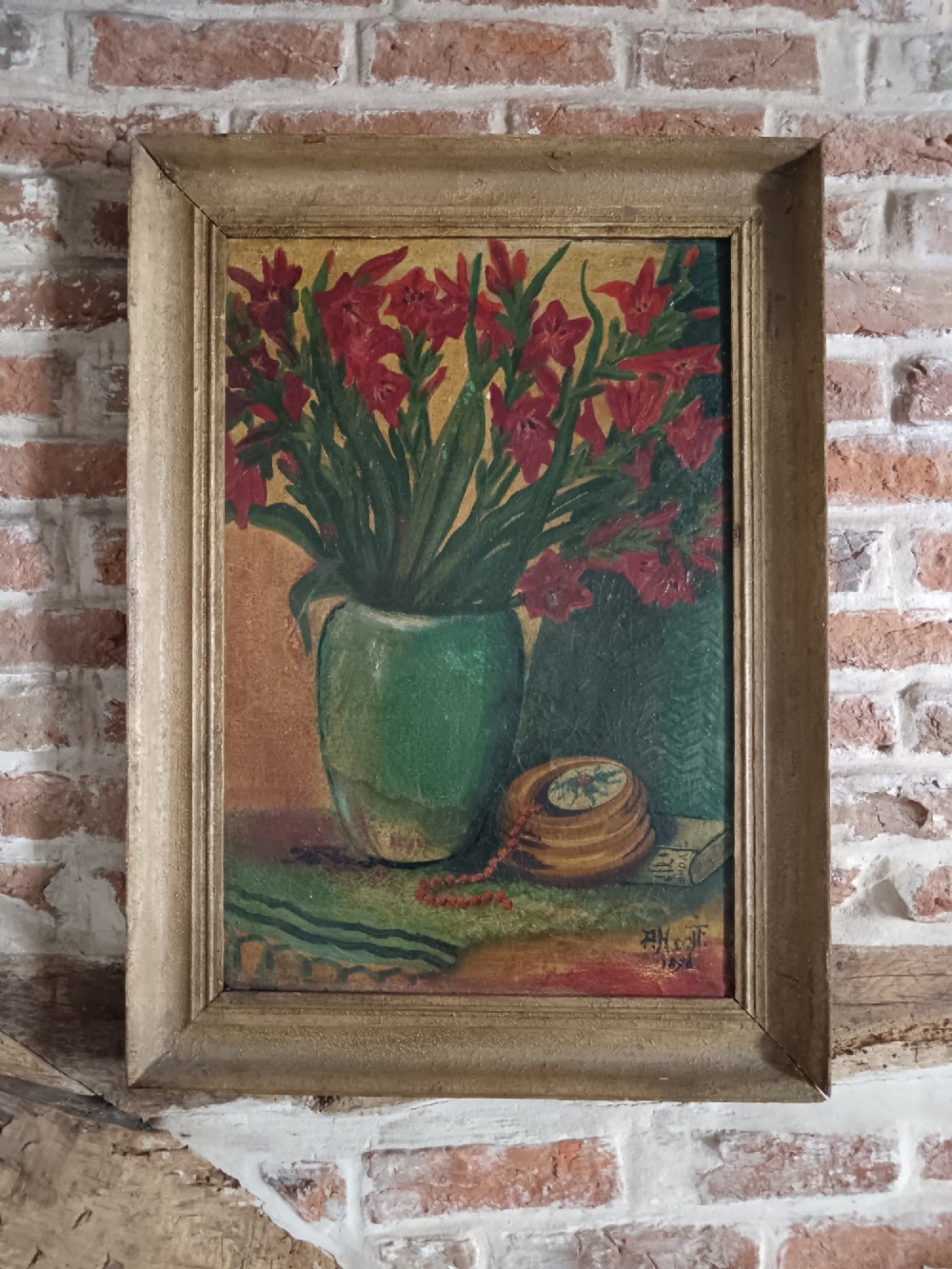 An 1896 post-impressionist oil painting depicting red flowers in a green vase alongside a wooden box and beads, set within a moulded frame. View II