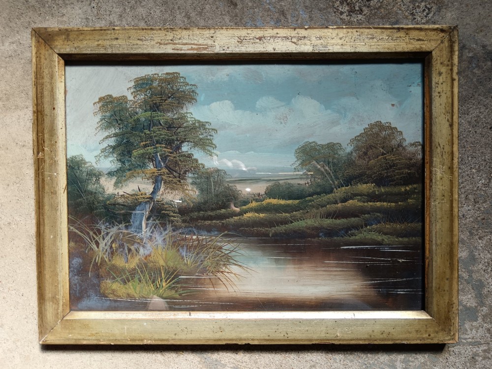 A set of four early 20th-century framed landscape paintings depicting river and woodland scenes set inside matching rectangular gilt frames. View IV