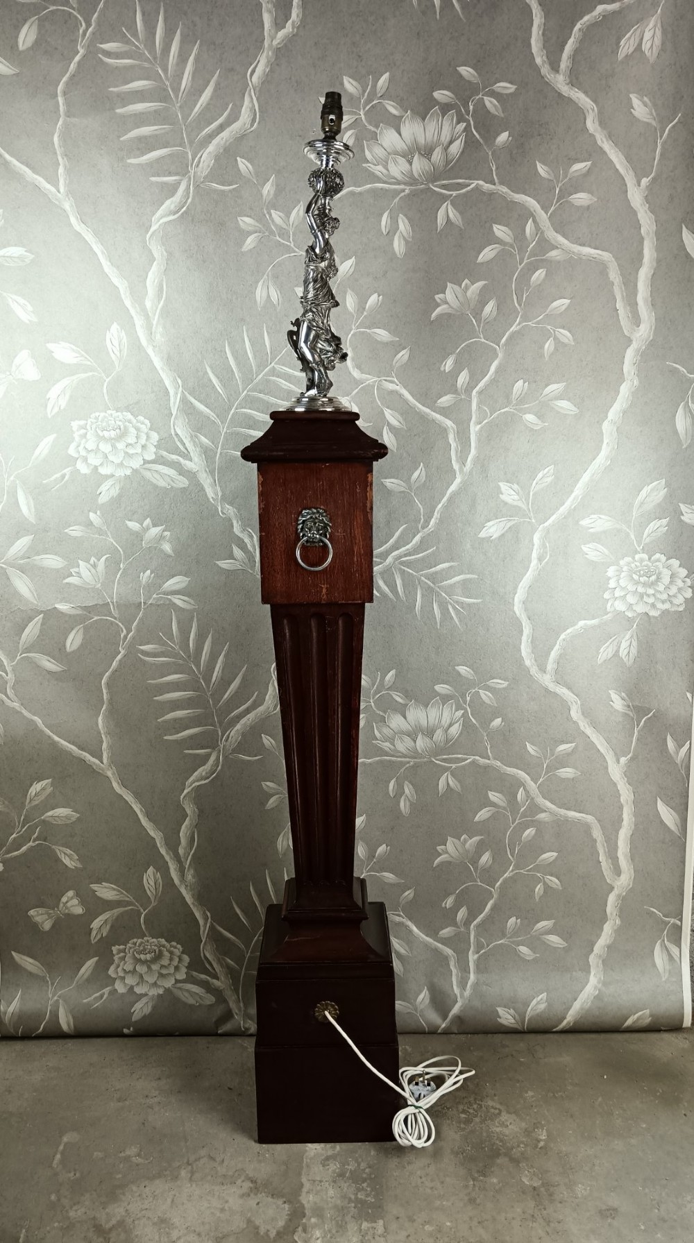 A dark wood tapered fluted pedestal column topped with a silver-plated classical female figural lamp fixture. View III