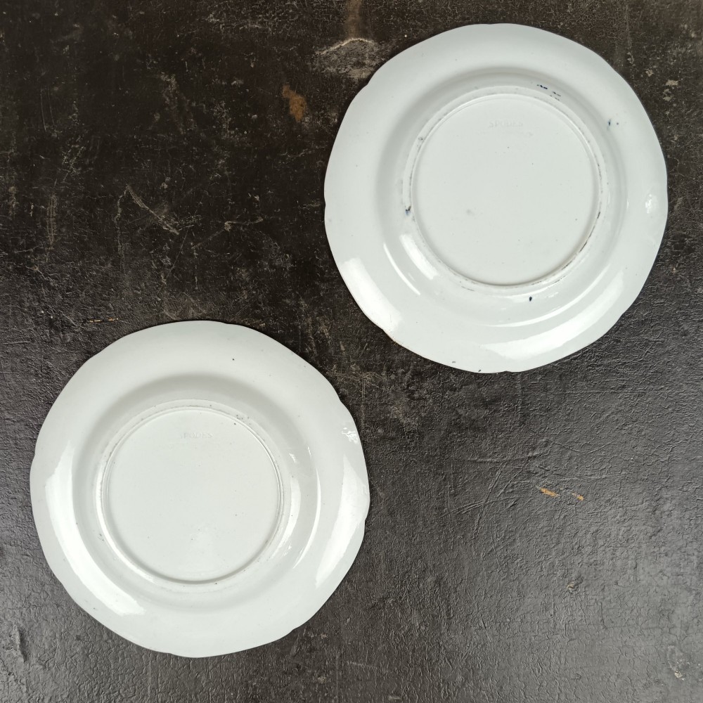 A pair of circular Georgian ceramic tea plates featuring blue and white floral underglaze decoration with scalloped edges. View VII