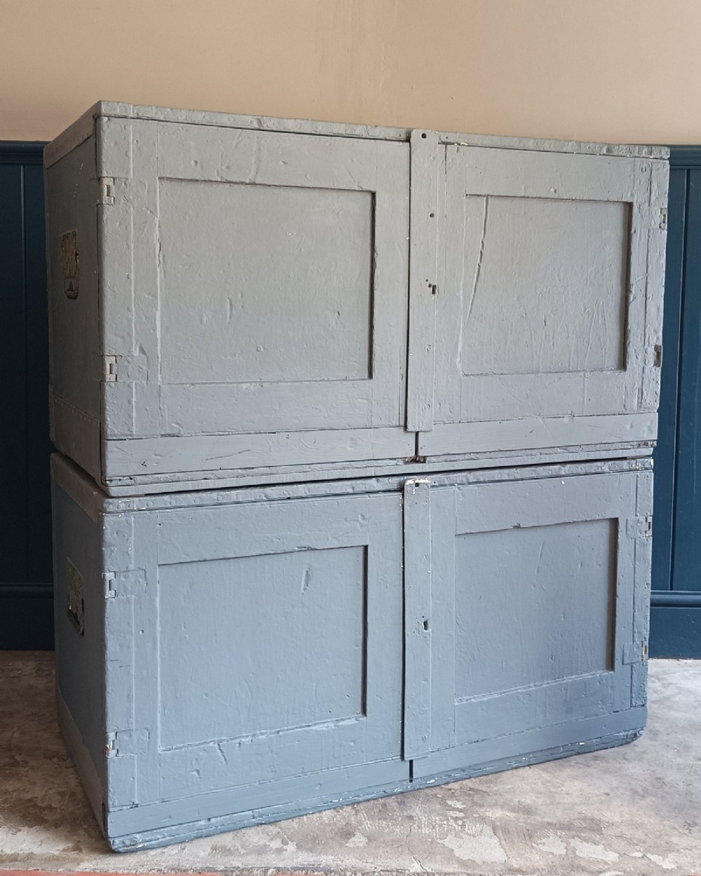 A slate grey painted 19th-century military campaign packing chest with iron flush handles, corner reinforcements, hinged doors, and an internal shelf. View XI