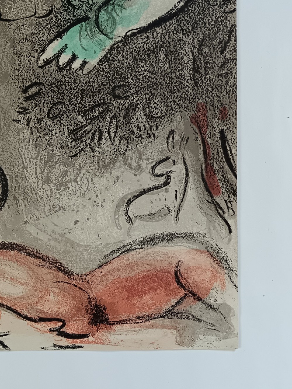 A 1960 double-sided colour lithograph on grey paper depicting a reclined terracotta figure beneath a green figurative motif and Hebrew lettering. View VI