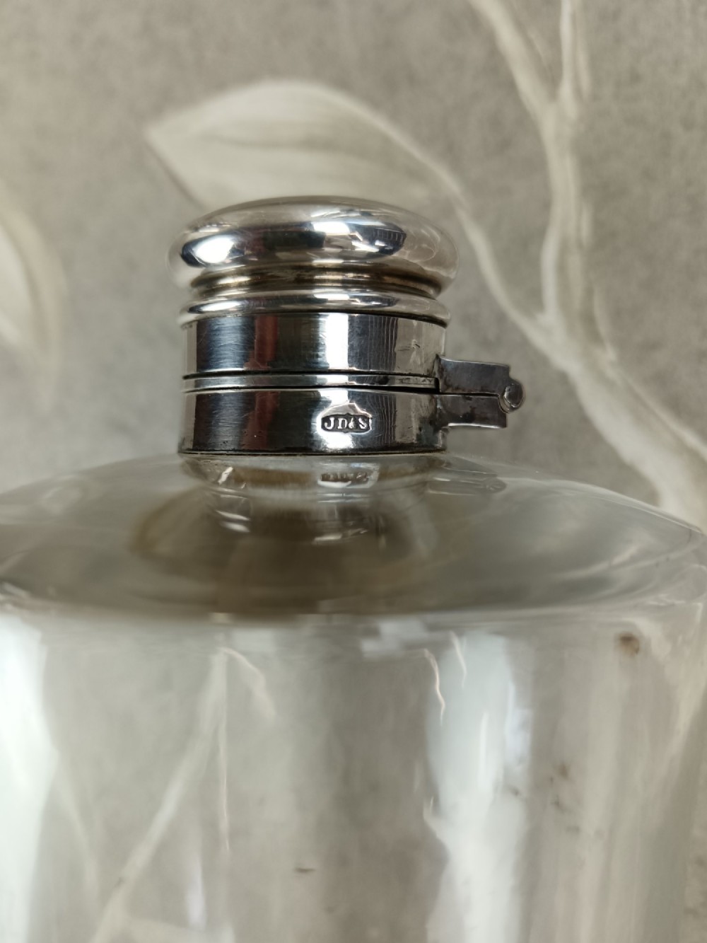 A Victorian leather campaign case with a shoulder strap alongside a glass flask and two silver-plated nesting beaker cups. View VIII