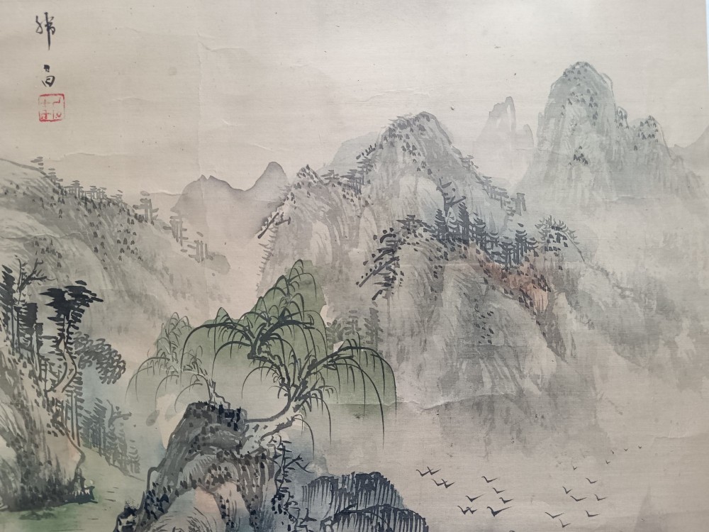 A pair of framed Chinese Shan Shui ink landscape paintings on silk depicting mountainous scenes and trees, presented in dark timber frames with gilded inner trims. View IX