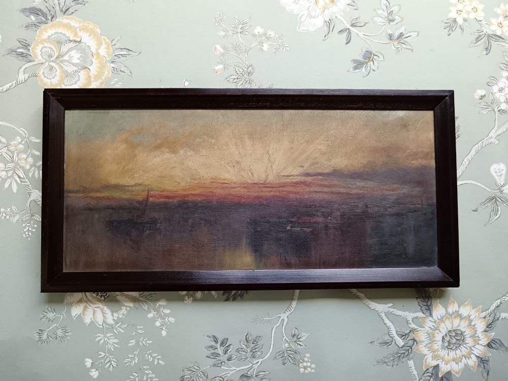 A pair of framed horizontal Edwardian oil paintings depicting atmospheric maritime scenes with sailboats at sunrise and sunset. View V