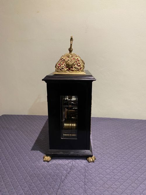 JONATHON LOWNDES EBONY AND BRASS BASKET TOP TABLE CLOCK CIRCA 1695 - ADDITIONAL PHOTO 1