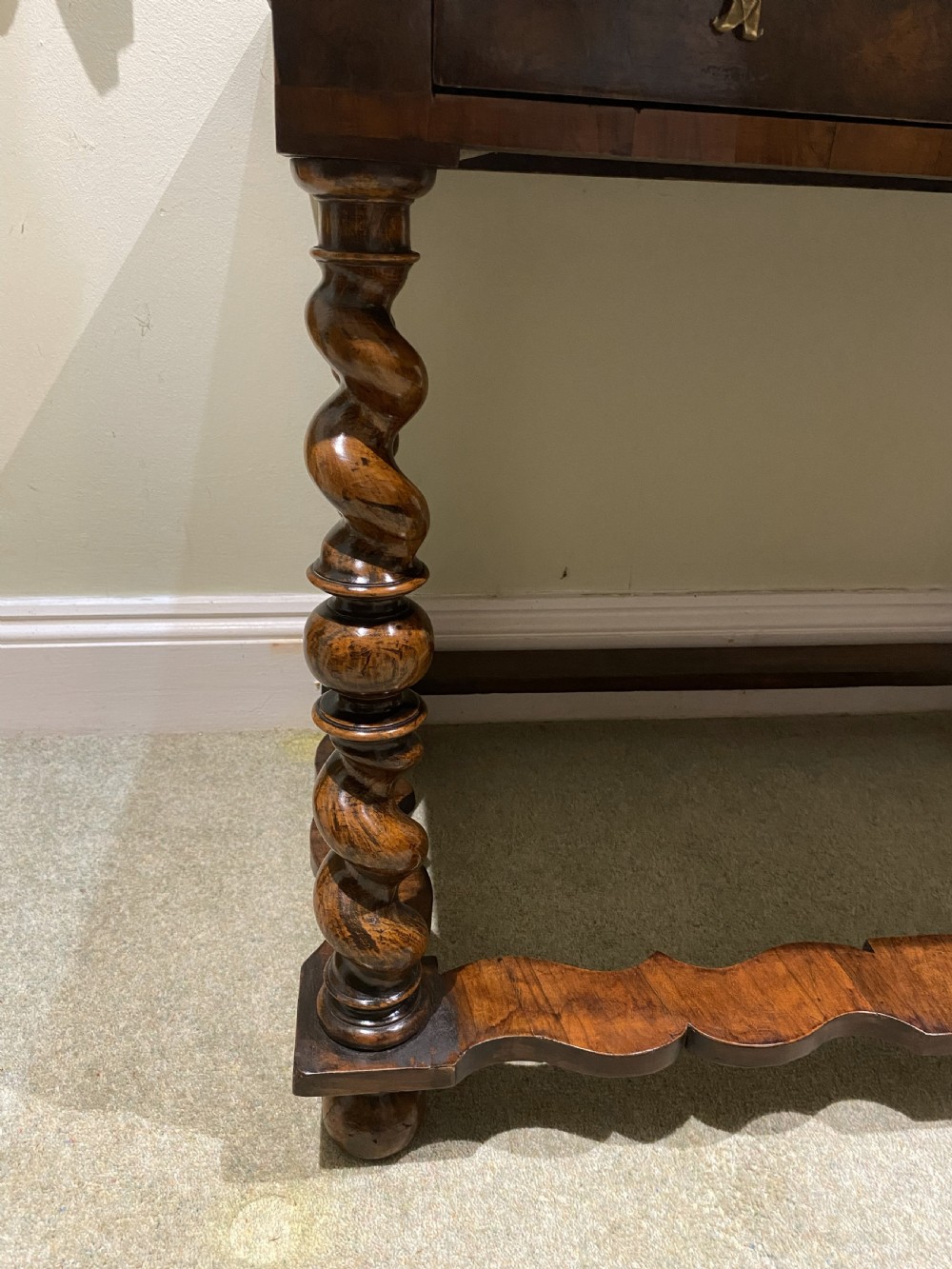 A William and Mary side table featuring an oyster olive veneer top with geometric holly inlays, spiral-turned legs, and shaped stretchers. View II